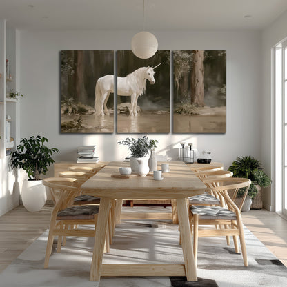 A white unicorn standing beside shallow water beneath tall shadowed trees 3 piece canvas wall art room and product view