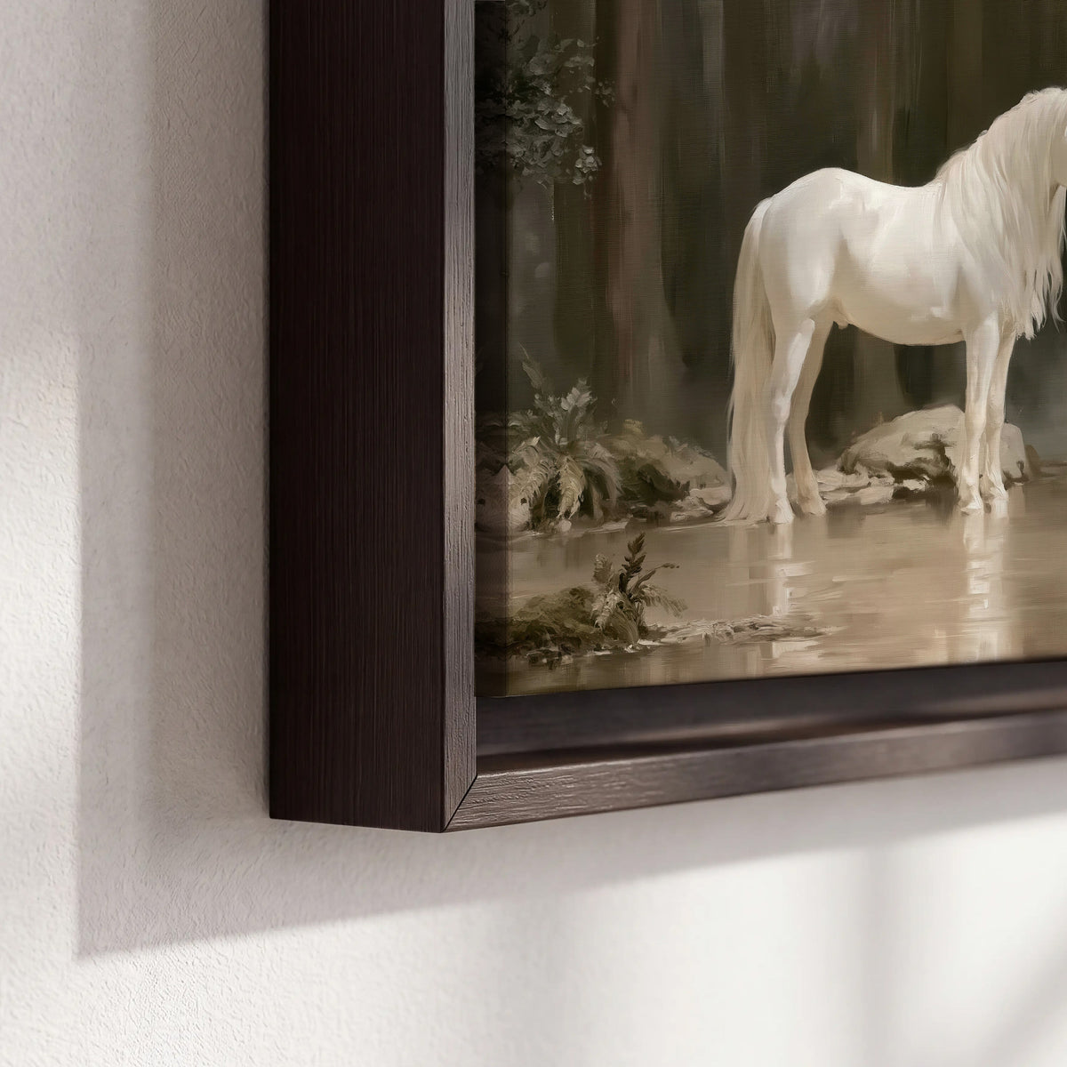 A white unicorn standing beside shallow water beneath tall shadowed trees 3 piece framed canvas wall art material and edge close up