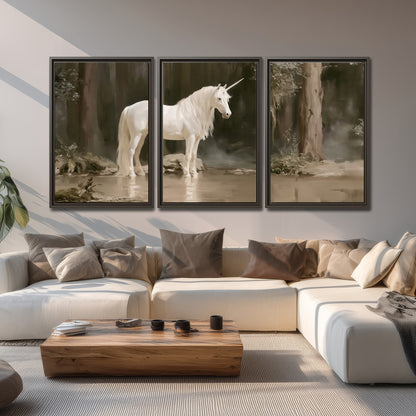 A white unicorn standing beside shallow water beneath tall shadowed trees 3 piece framed canvas wall art displayed in a living room