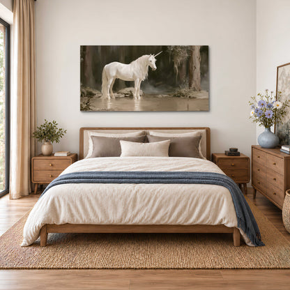 A white unicorn standing beside shallow water beneath tall shadowed trees single canvas wall art styled in an interior