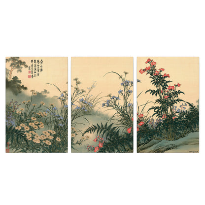 Delicate wildflowers and ferns arranged on a warm neutral ground with decorative script 3 piece canvas wall art viewed straight on