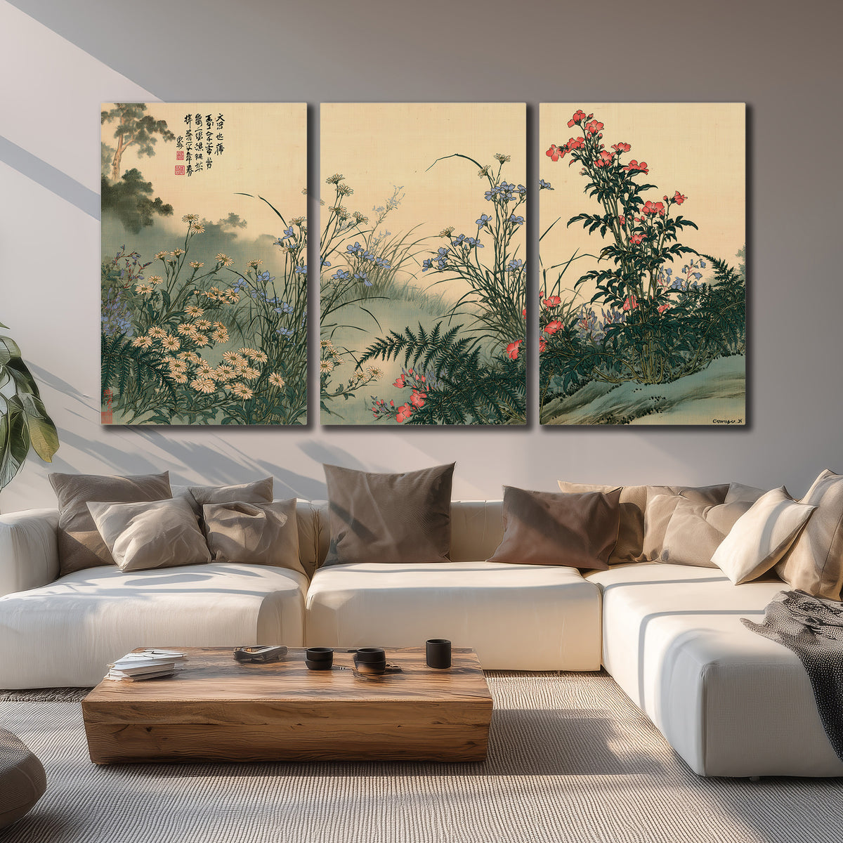 Delicate wildflowers and ferns arranged on a warm neutral ground with decorative script 3 piece canvas wall art displayed in a living room