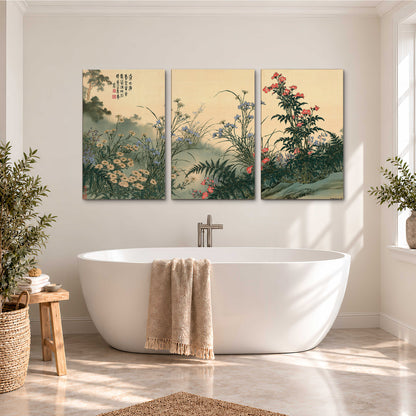 Delicate wildflowers and ferns arranged on a warm neutral ground with decorative script 3 piece canvas wall art styled in an interior