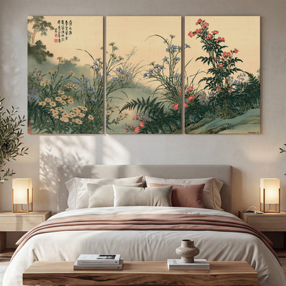 Delicate wildflowers and ferns arranged on a warm neutral ground with decorative script 3 piece canvas wall art displayed in a bedroom