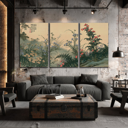 Delicate wildflowers and ferns arranged on a warm neutral ground with decorative script 3 piece canvas wall art displayed in a industrial room
