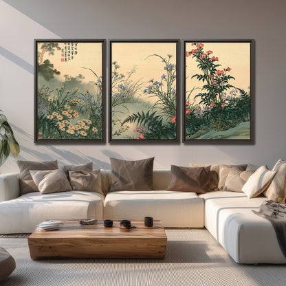 Delicate wildflowers and ferns arranged on a warm neutral ground with decorative script 3 piece framed canvas wall art displayed in a living room