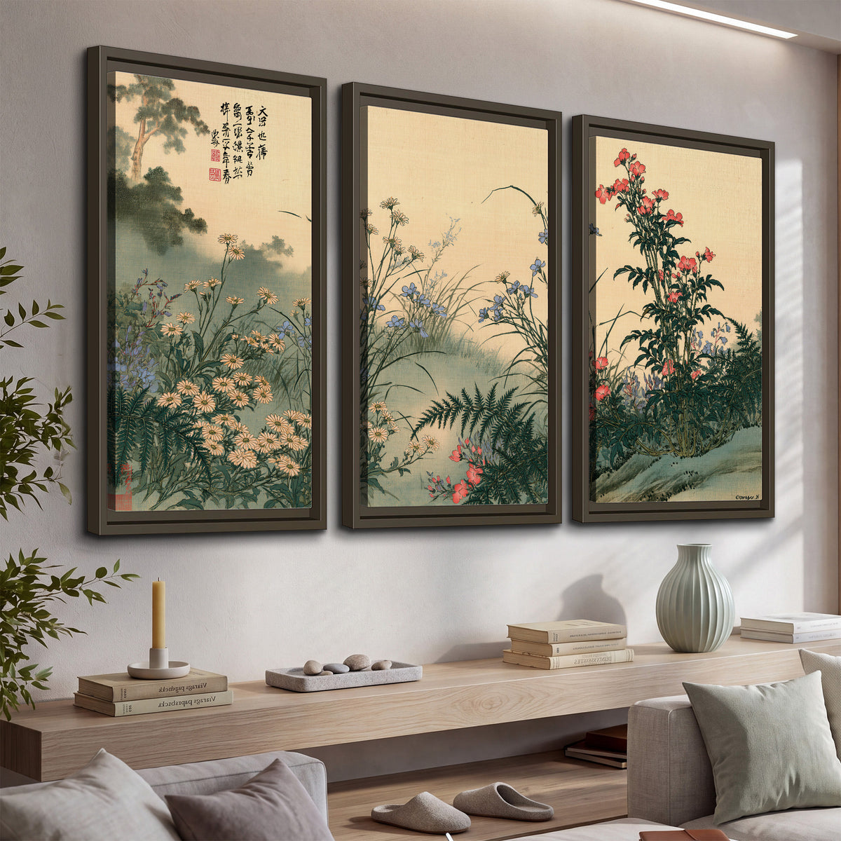 Delicate wildflowers and ferns arranged on a warm neutral ground with decorative script 3 piece framed canvas wall art displayed in a console