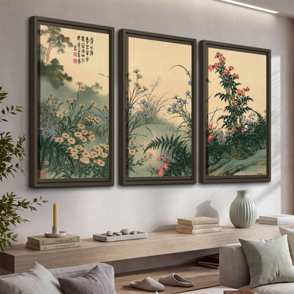 Delicate wildflowers and ferns arranged on a warm neutral ground with decorative script 3 piece framed canvas wall art displayed in a console