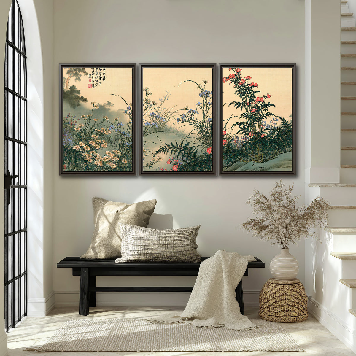 Delicate wildflowers and ferns arranged on a warm neutral ground with decorative script 3 piece framed canvas wall art displayed in a entryway