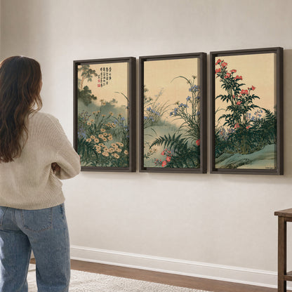 Delicate wildflowers and ferns arranged on a warm neutral ground with decorative script 3 piece framed canvas wall art three panel arrangement on a wall