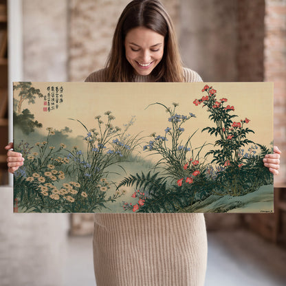 Delicate wildflowers and ferns arranged on a warm neutral ground with decorative script single canvas wall art held in hands