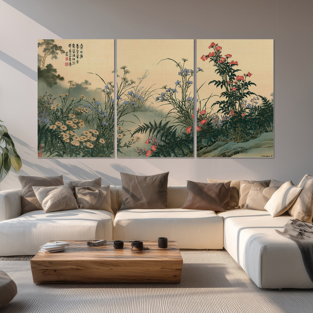 Delicate wildflowers and ferns arranged on a warm neutral ground with decorative script set of 3 poster prints displayed in a living room