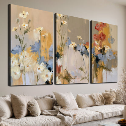 Loose white and yellow flowers set against vertical blue and golden strokes 3 piece canvas wall art room and product view