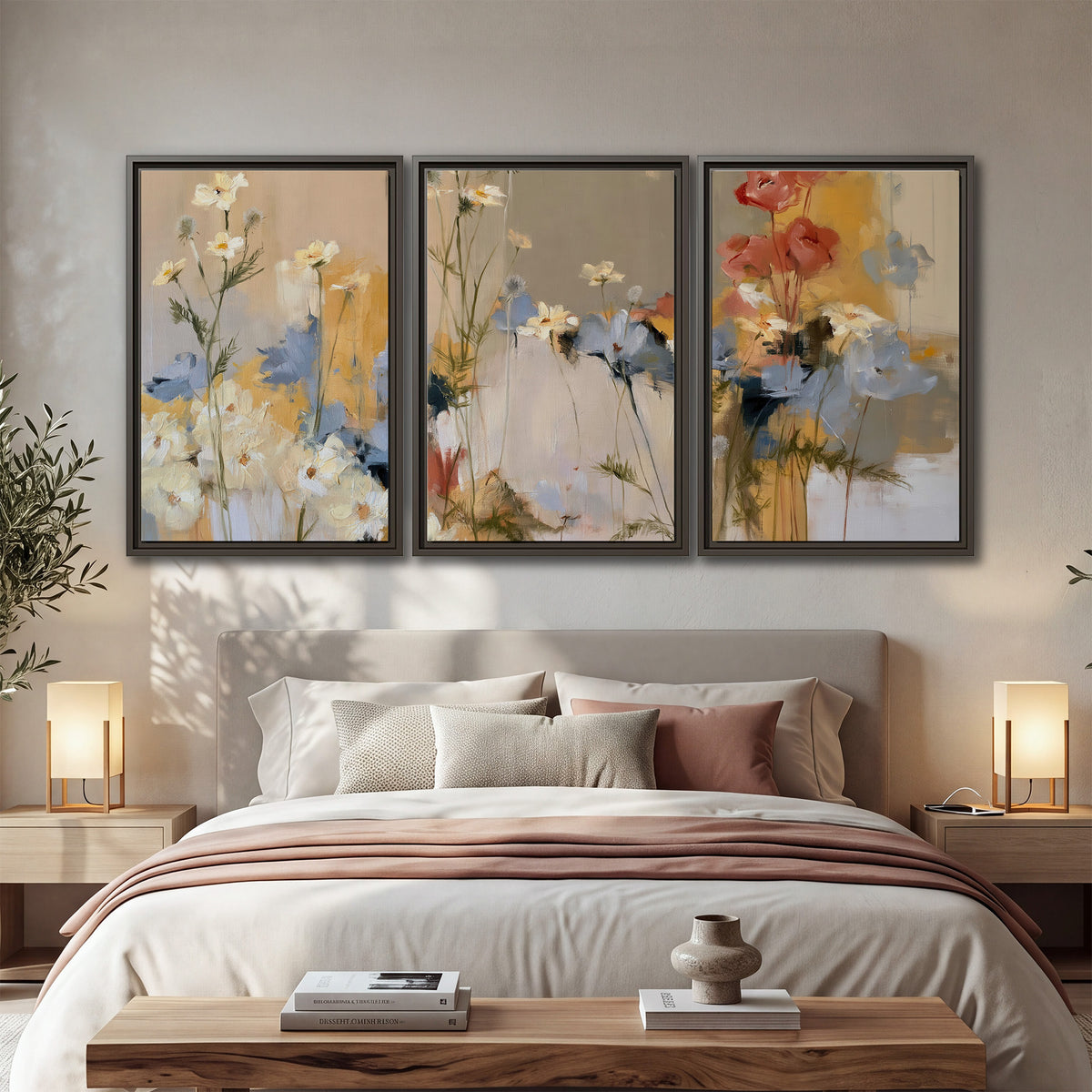 Loose white and yellow flowers set against vertical blue and golden strokes 3 piece framed canvas wall art displayed in a bedroom