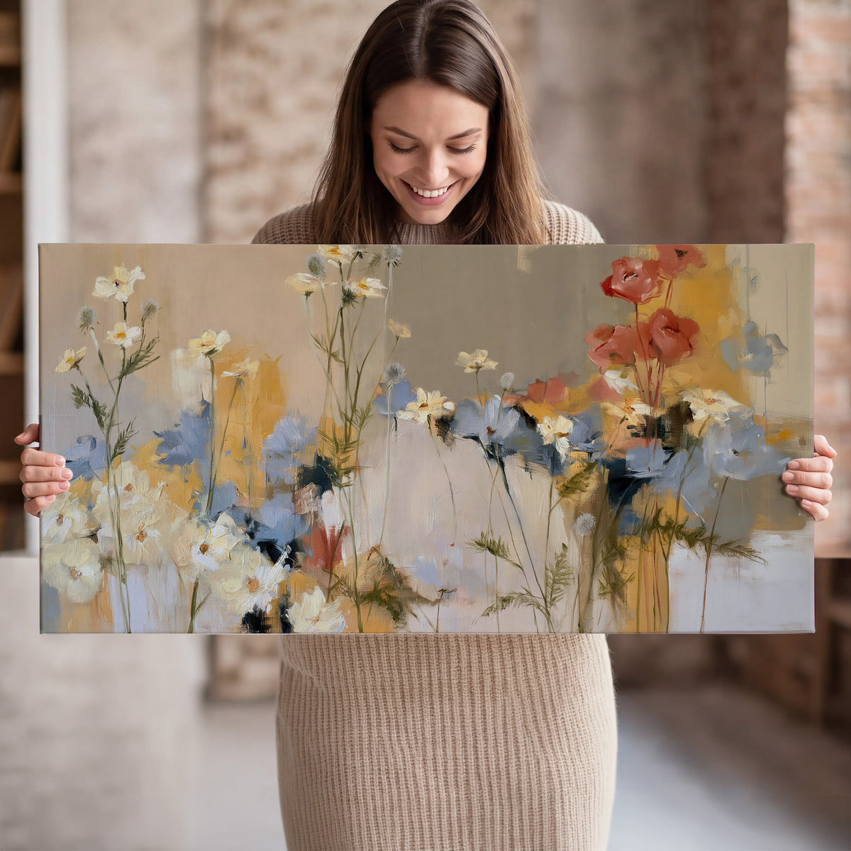 Loose white and yellow flowers set against vertical blue and golden strokes single canvas wall art held in hands