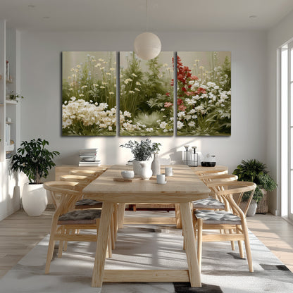 A soft meadow of white daisies and tall red blooms against a green background 3 piece canvas wall art room and product view
