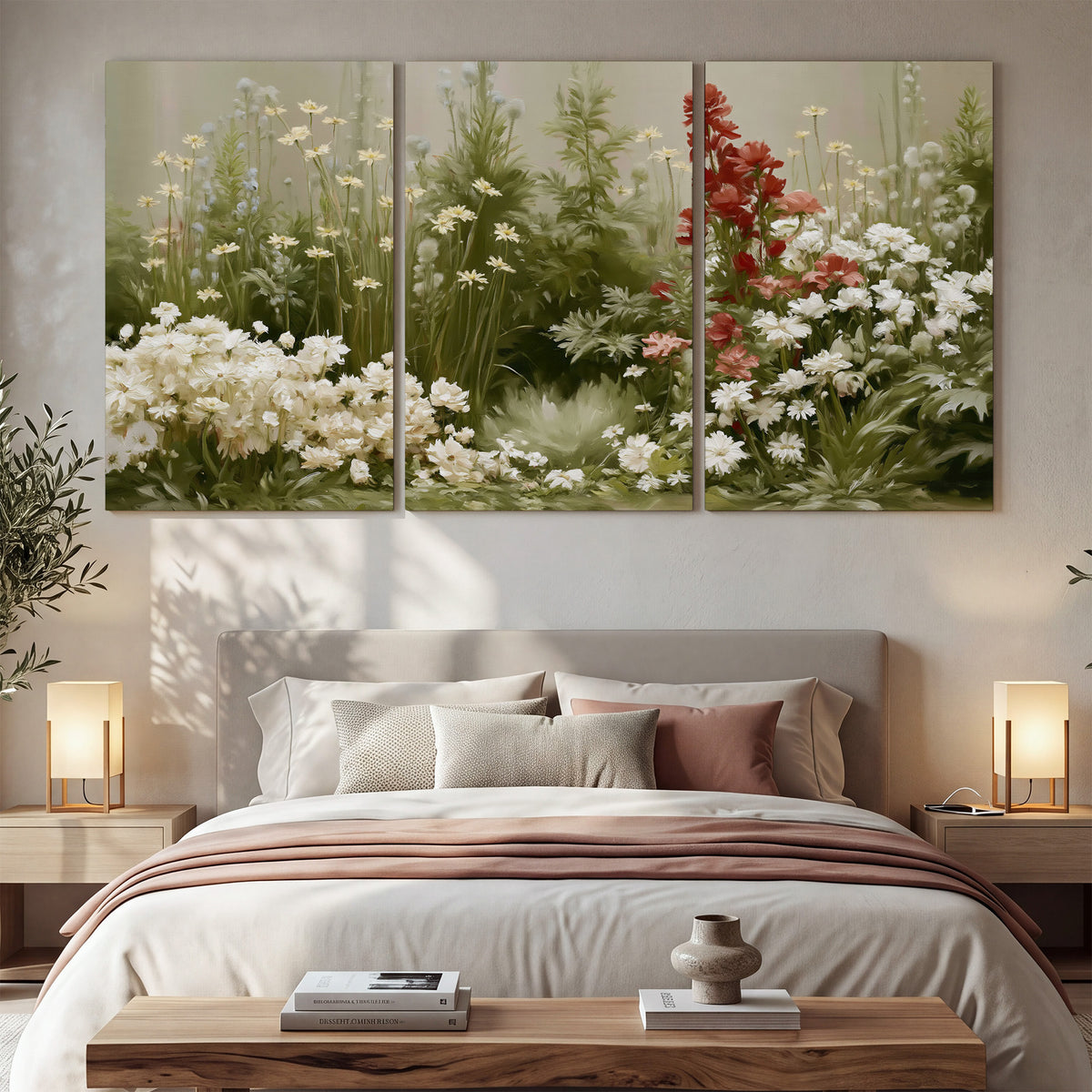A soft meadow of white daisies and tall red blooms against a green background 3 piece canvas wall art displayed in a bedroom