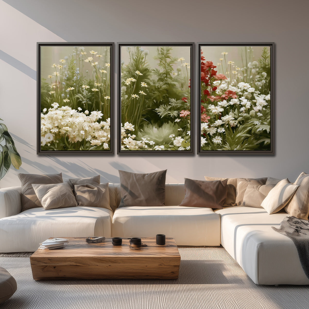 A soft meadow of white daisies and tall red blooms against a green background 3 piece framed canvas wall art displayed in a living room