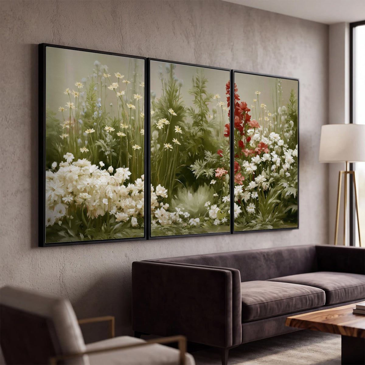 A soft meadow of white daisies and tall red blooms against a green background 3 piece framed canvas wall art displayed in a modern living room