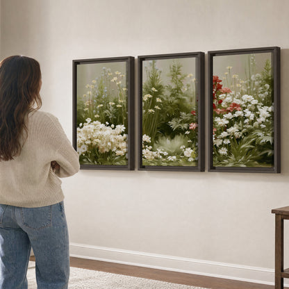 A soft meadow of white daisies and tall red blooms against a green background 3 piece framed canvas wall art three panel arrangement on a wall