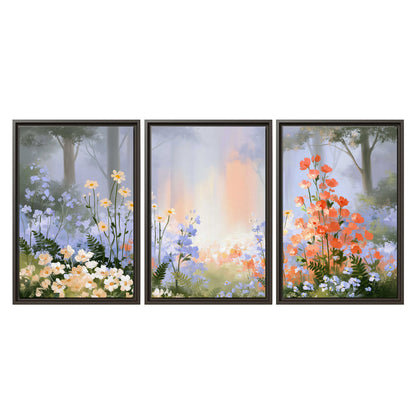 Colorful white, blue and orange flowers beneath a warm shaft of woodland light 3 piece framed canvas wall art viewed straight on