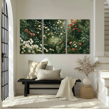 Small white flowers and red blossoms among deep green woodland leaves 3 piece canvas wall art displayed in a entryway