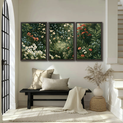 Small white flowers and red blossoms among deep green woodland leaves 3 piece framed canvas wall art displayed in a entryway