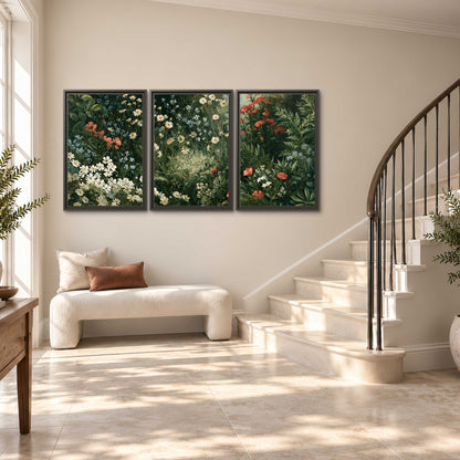 Small white flowers and red blossoms among deep green woodland leaves 3 piece framed canvas wall art styled in an interior