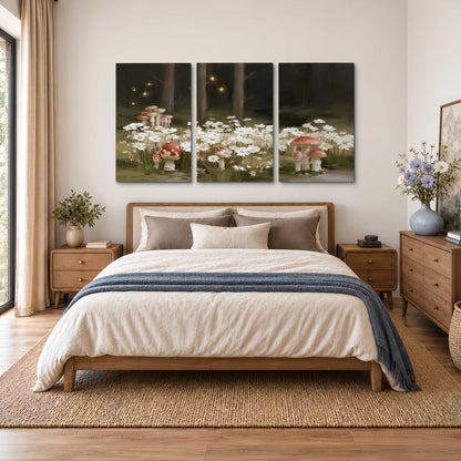 Pale daisies and red-capped mushrooms in a dark meadow with tiny painted points of light 3 piece canvas wall art styled in an interior