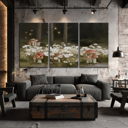 Pale daisies and red-capped mushrooms in a dark meadow with tiny painted points of light 3 piece canvas wall art displayed in a industrial room