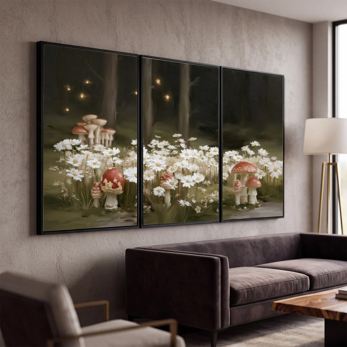 Pale daisies and red-capped mushrooms in a dark meadow with tiny painted points of light 3 piece framed canvas wall art displayed in a modern living room