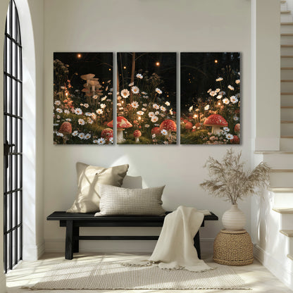Red mushrooms and delicate white flowers glowing in a painted nighttime woodland scene 3 piece canvas wall art displayed in a entryway