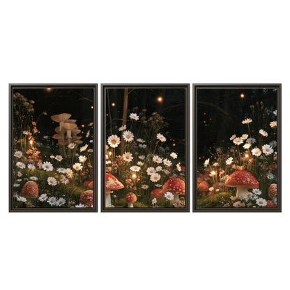 Red mushrooms and delicate white flowers glowing in a painted nighttime woodland scene 3 piece framed canvas wall art viewed straight on