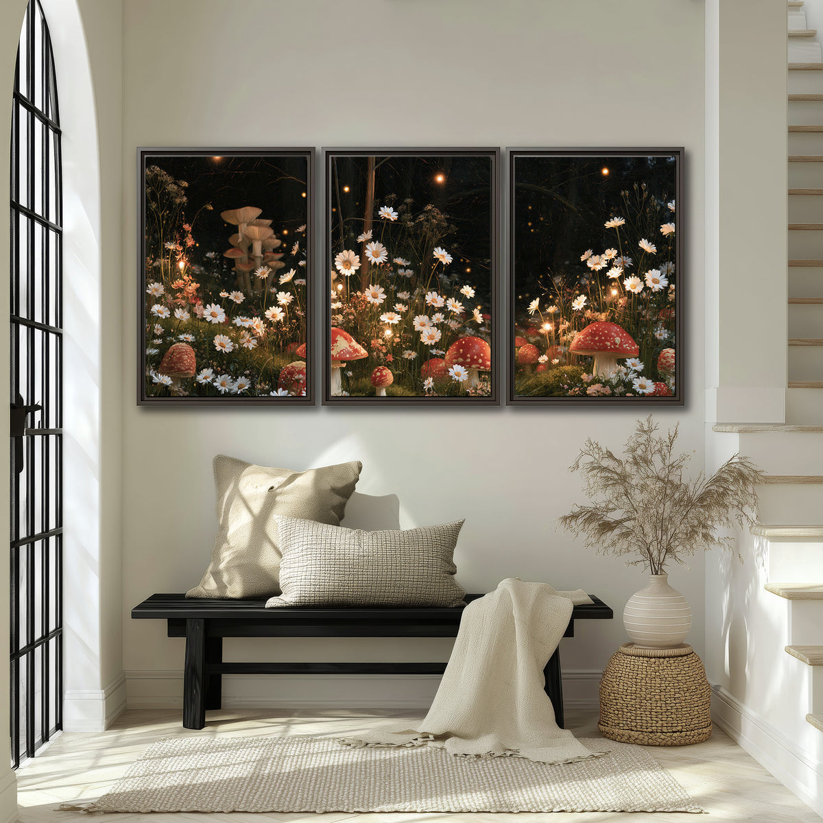 Red mushrooms and delicate white flowers glowing in a painted nighttime woodland scene 3 piece framed canvas wall art displayed in a entryway