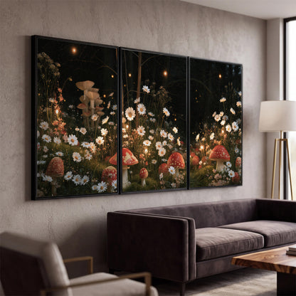 Red mushrooms and delicate white flowers glowing in a painted nighttime woodland scene 3 piece framed canvas wall art displayed in a modern living room