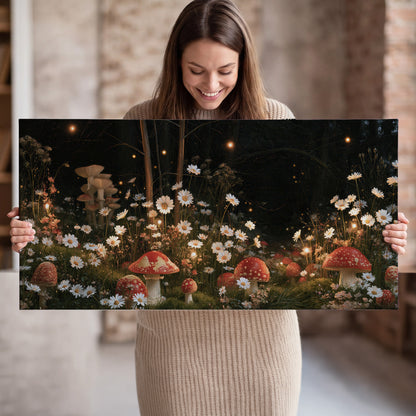 Red mushrooms and delicate white flowers glowing in a painted nighttime woodland scene single canvas wall art held in hands