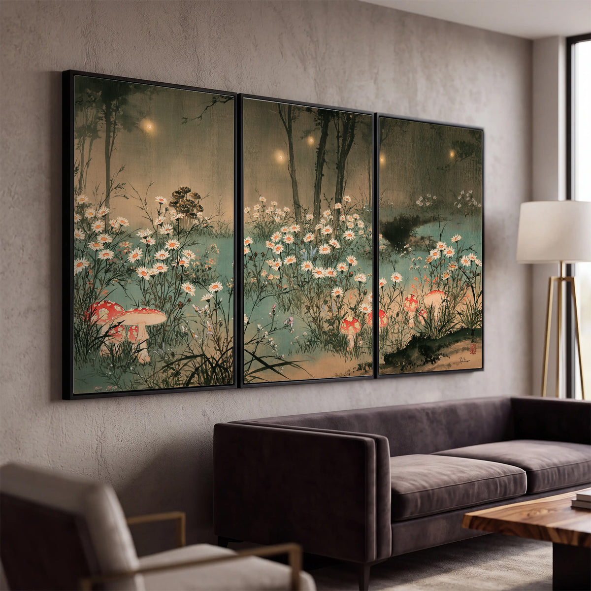 A wide meadow of white daisies and small red mushrooms beneath dark woodland trees 3 piece framed canvas wall art displayed in a modern living room