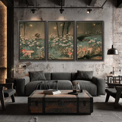 A wide meadow of white daisies and small red mushrooms beneath dark woodland trees 3 piece framed canvas wall art displayed in a industrial room