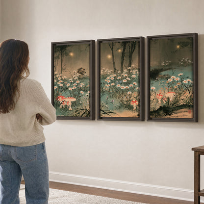 A wide meadow of white daisies and small red mushrooms beneath dark woodland trees 3 piece framed canvas wall art three panel arrangement on a wall