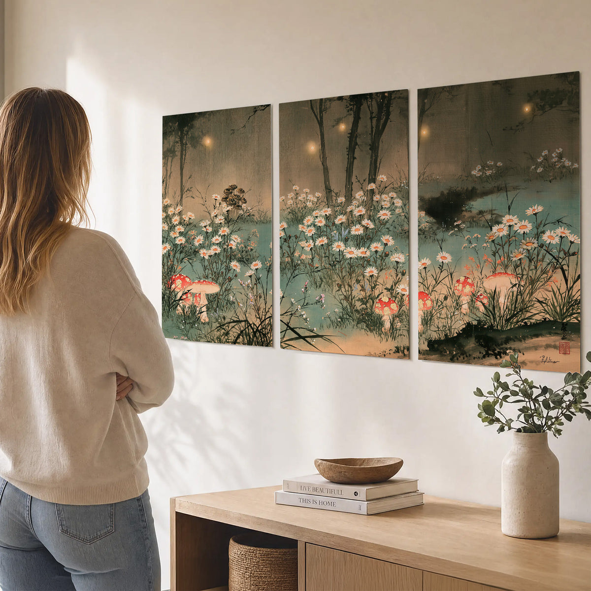 A wide meadow of white daisies and small red mushrooms beneath dark woodland trees set of 3 poster prints three panel arrangement on a wall