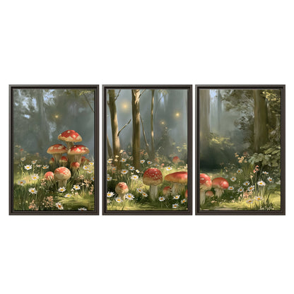 Red-capped mushrooms and white flowers beside tall trees in a sunlit forest 3 piece framed canvas wall art viewed straight on