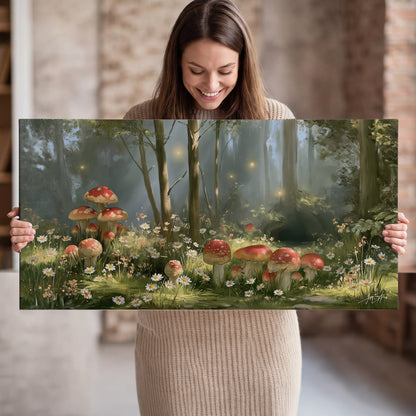 Red-capped mushrooms and white flowers beside tall trees in a sunlit forest single canvas wall art held in hands