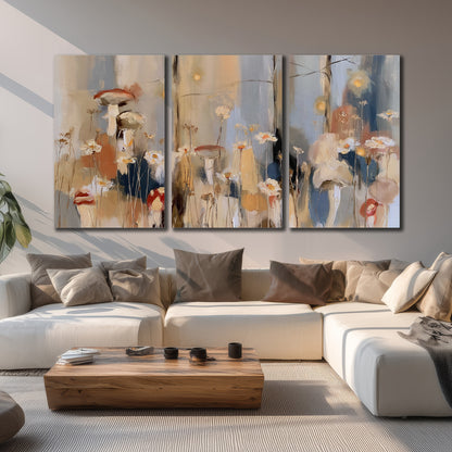 Loose mushroom and flower forms among vertical blue, ochre and cream strokes 3 piece canvas wall art displayed in a living room