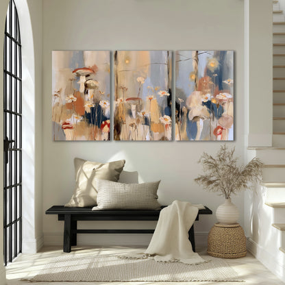 Loose mushroom and flower forms among vertical blue, ochre and cream strokes 3 piece canvas wall art displayed in a entryway