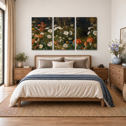 White daisies and warm red mushrooms scattered across a dark woodland garden 3 piece canvas wall art styled in an interior