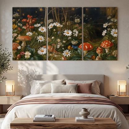 White daisies and warm red mushrooms scattered across a dark woodland garden 3 piece canvas wall art displayed in a bedroom