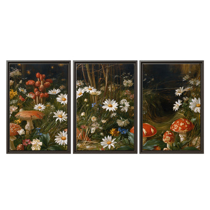 White daisies and warm red mushrooms scattered across a dark woodland garden 3 piece framed canvas wall art viewed straight on