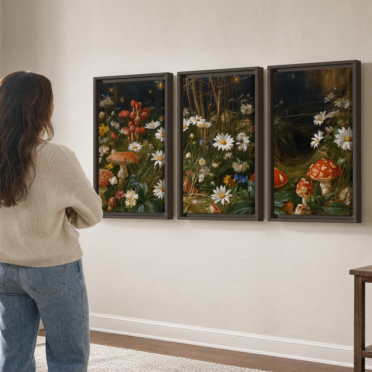 White daisies and warm red mushrooms scattered across a dark woodland garden 3 piece framed canvas wall art three panel arrangement on a wall