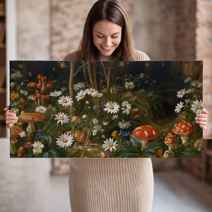 White daisies and warm red mushrooms scattered across a dark woodland garden single canvas wall art held in hands