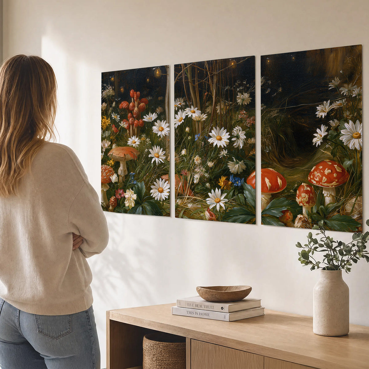 White daisies and warm red mushrooms scattered across a dark woodland garden set of 3 poster prints three panel arrangement on a wall